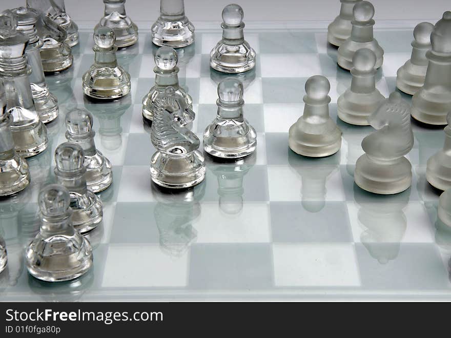 Chess Board With Pieces In Glass