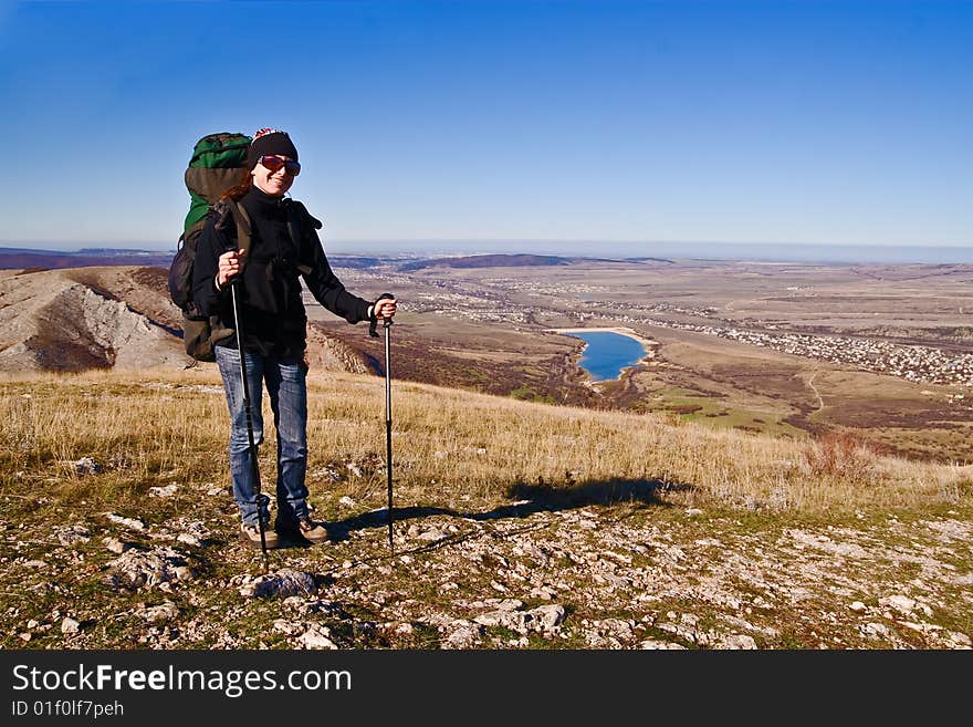 Hiker Girl On The Mountain Summit