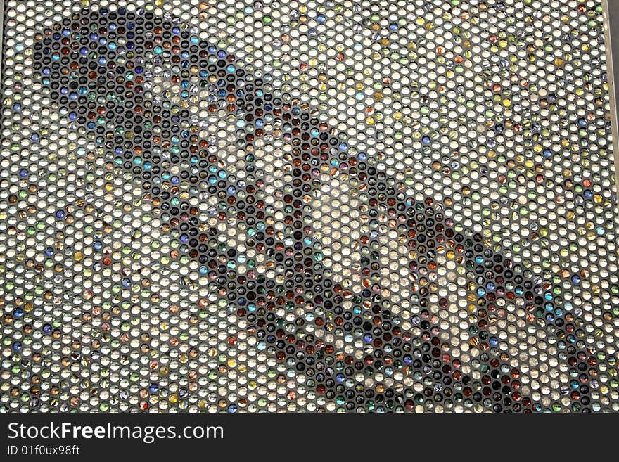 Abstract background with a leaf composed of glass beads