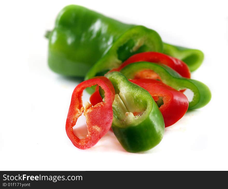 Red and green paprica isolated on white background