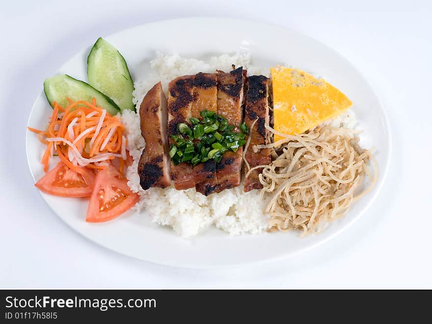 Grilled chicken over rice