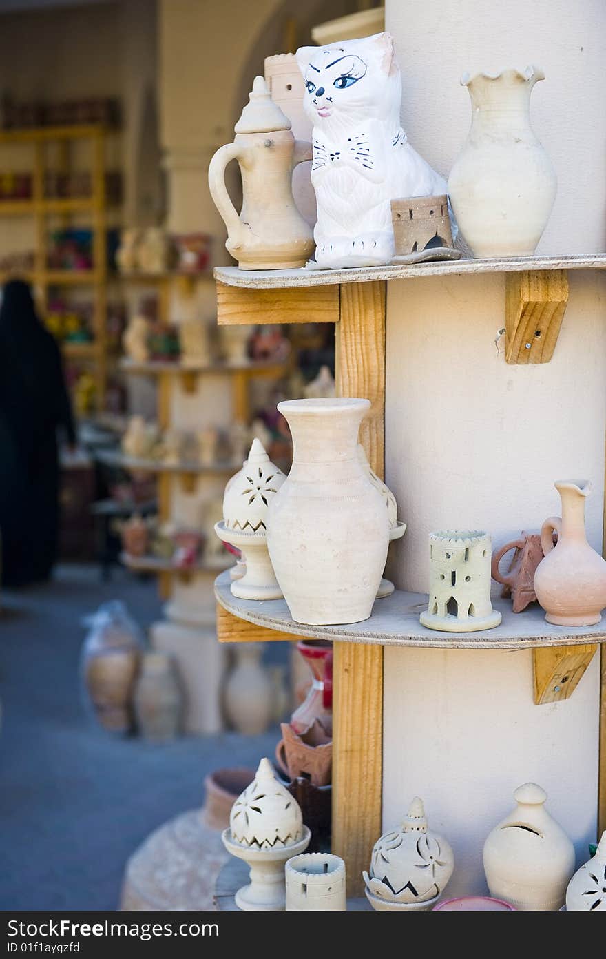 A traditional Arabian market in Nizwa, Oman, with ceramic water pots and incense burners from the village of Bahla. A traditional Arabian market in Nizwa, Oman, with ceramic water pots and incense burners from the village of Bahla.