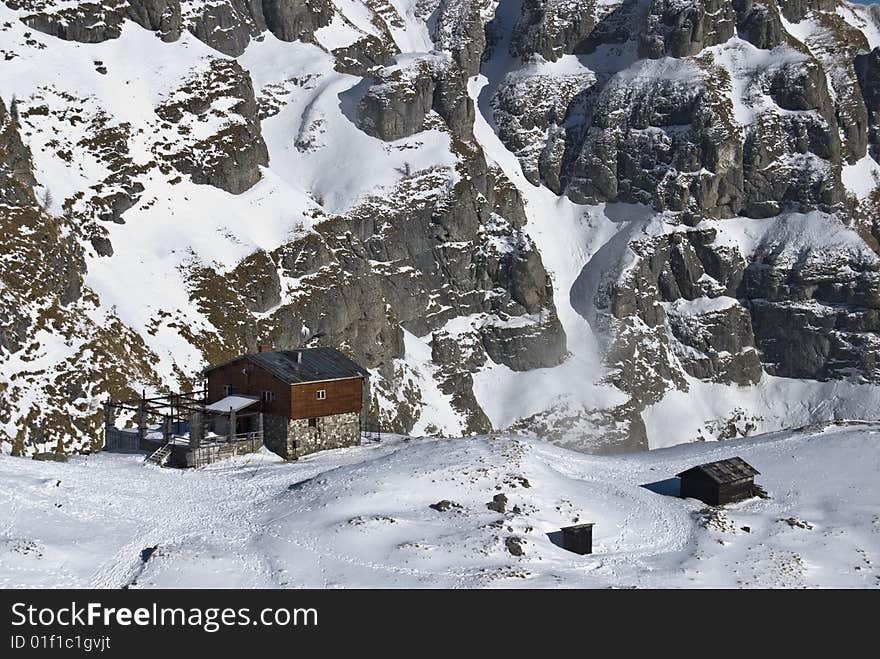 Mountain hut in winter,in Bucegi mountains,Romania