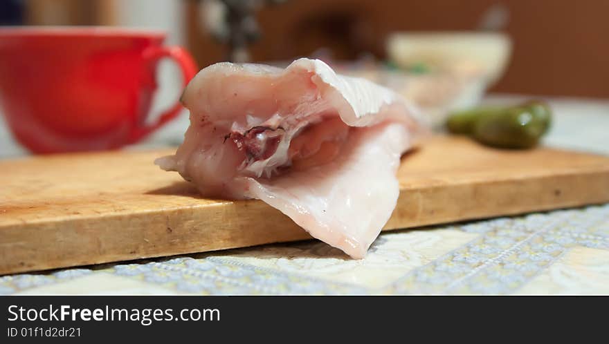 White fish on cookie table at home kitchen