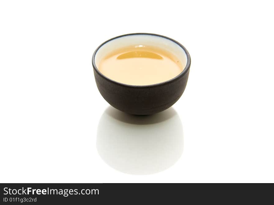 Cup of tea isolated on white and reflection. Cup of tea isolated on white and reflection.