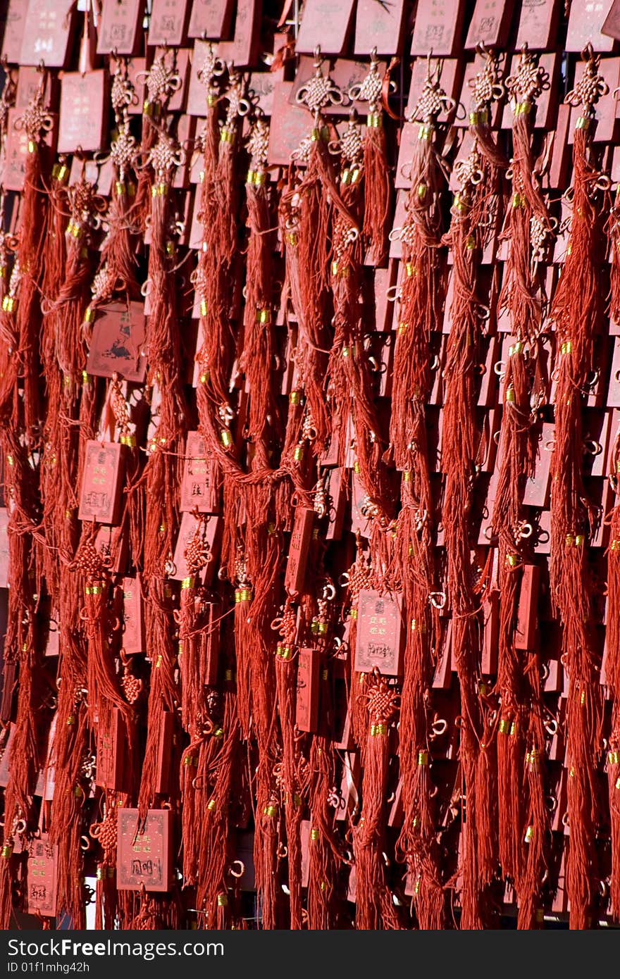 Celebrations in Beijing for the Chinese New Year - temple fair - auspicious Buddhist red tablets. Celebrations in Beijing for the Chinese New Year - temple fair - auspicious Buddhist red tablets