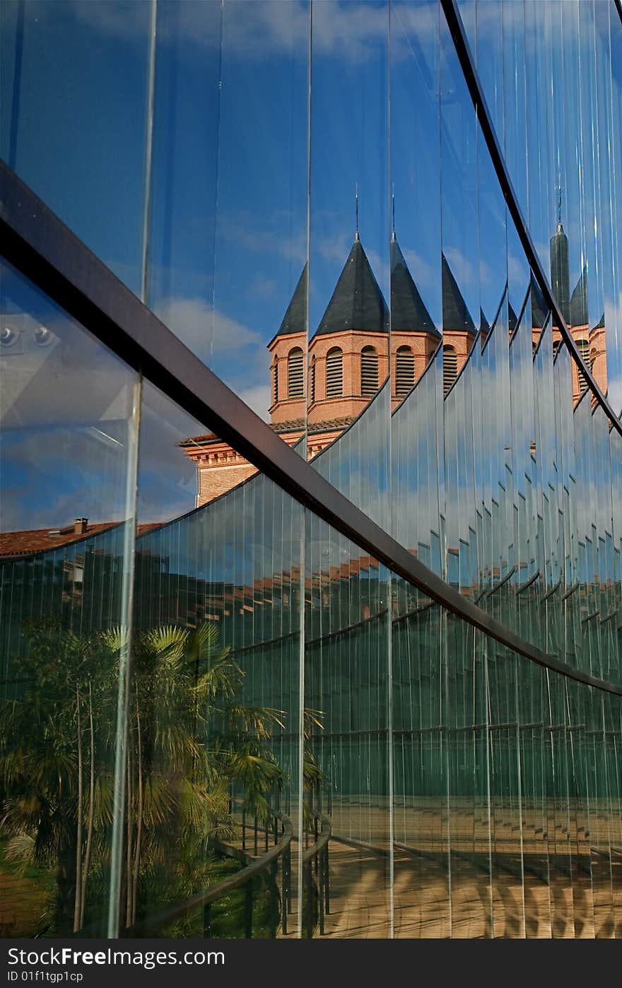 The reflection on the glass wall of the natural history museum in Toulouse