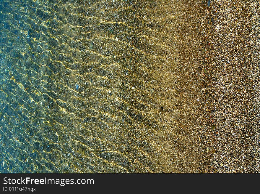 Blue sea and yellow sand. Blue sea and yellow sand