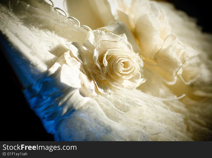 Artificial flowers og the weddding dress. Artificial flowers og the weddding dress