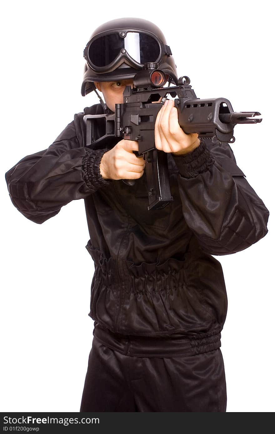 One soldier with the gun in the hands on a white background. One soldier with the gun in the hands on a white background