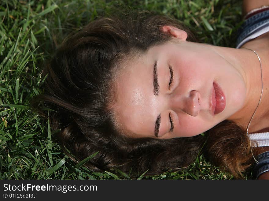 Sweet woman rest on the grass. Sweet woman rest on the grass