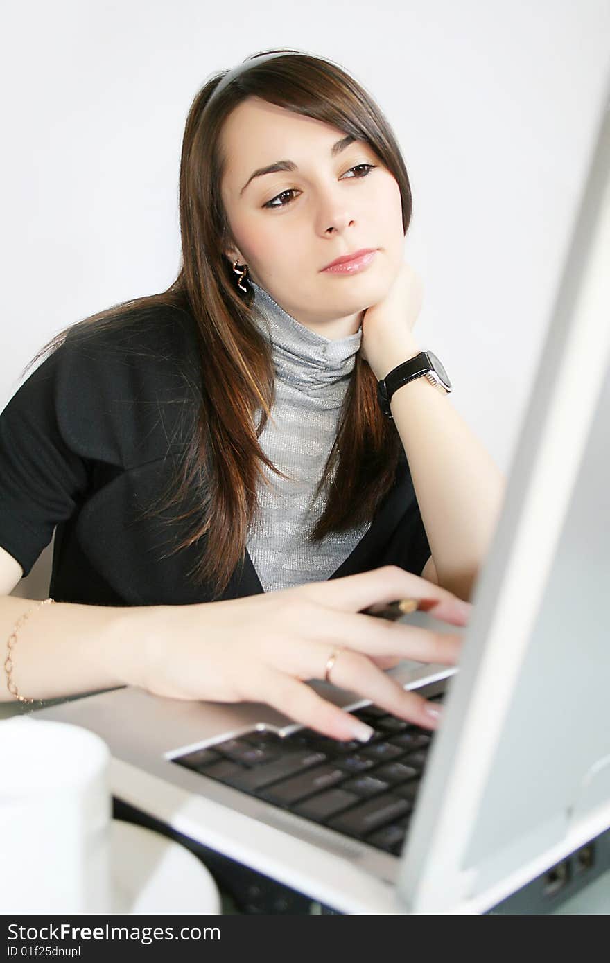 Young businesswoman, secretary or student with laptop