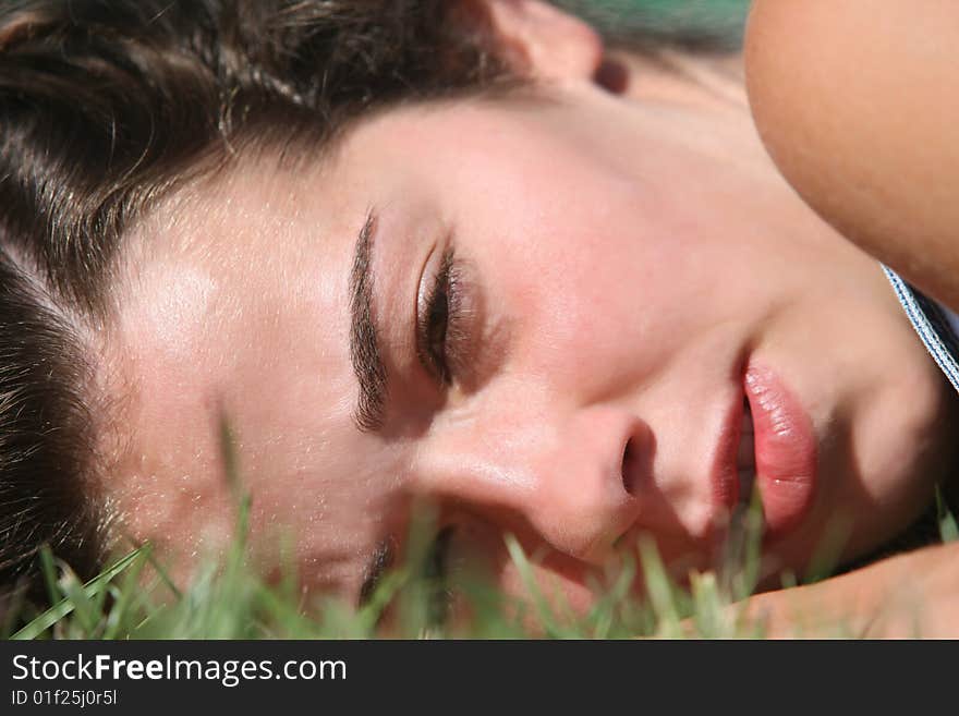 Sweet woman rest on the grass. Sweet woman rest on the grass