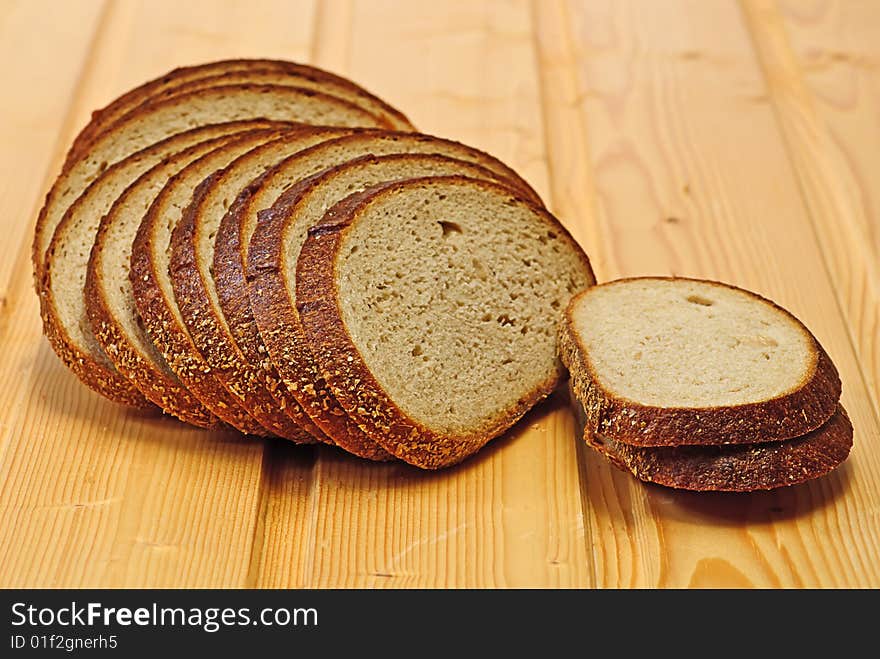 Bread On Wooden Plate