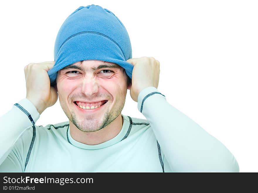 Young man in sport cap and sweater on white. Young man in sport cap and sweater on white