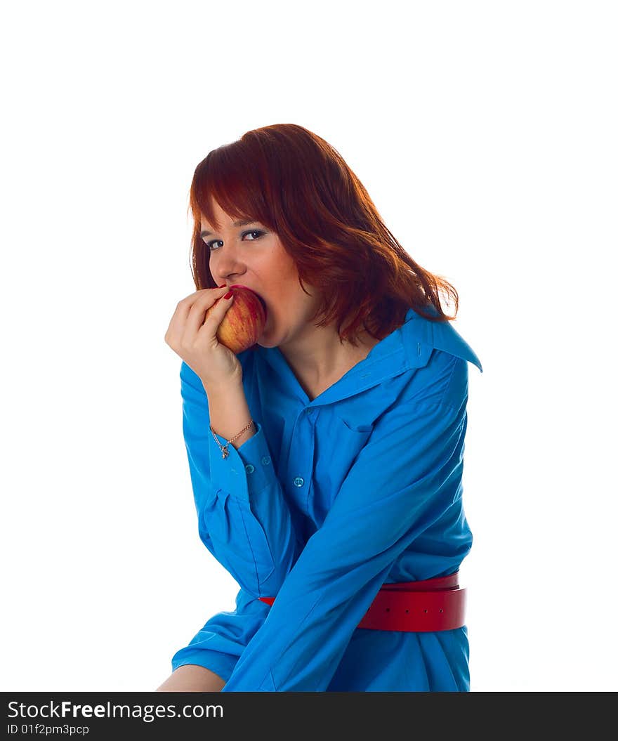 Healthy woman takes a bite out of an apple. Healthy woman takes a bite out of an apple