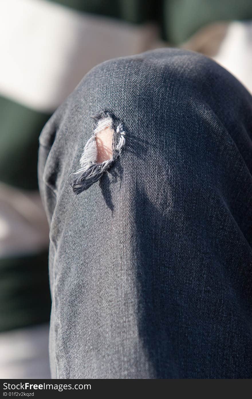 Hole In Jeans