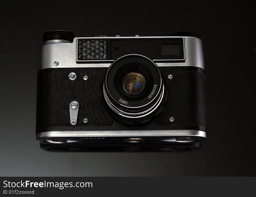 Vintage SLR camera in black and silver colors. Vintage SLR camera in black and silver colors