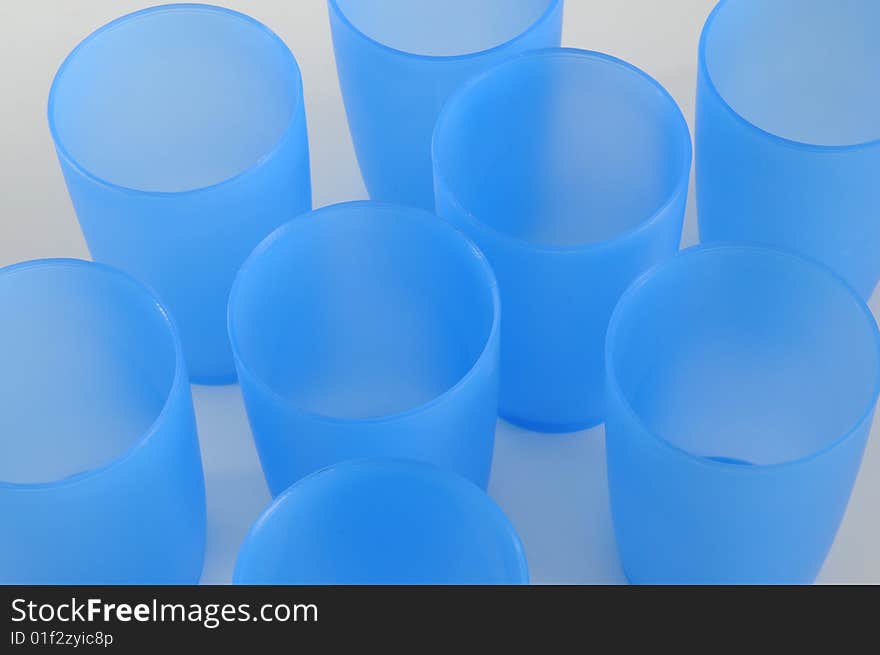 Some transparent plastic beaker,blue color.