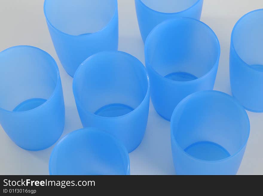 Some transparent plastic beaker,blue color.