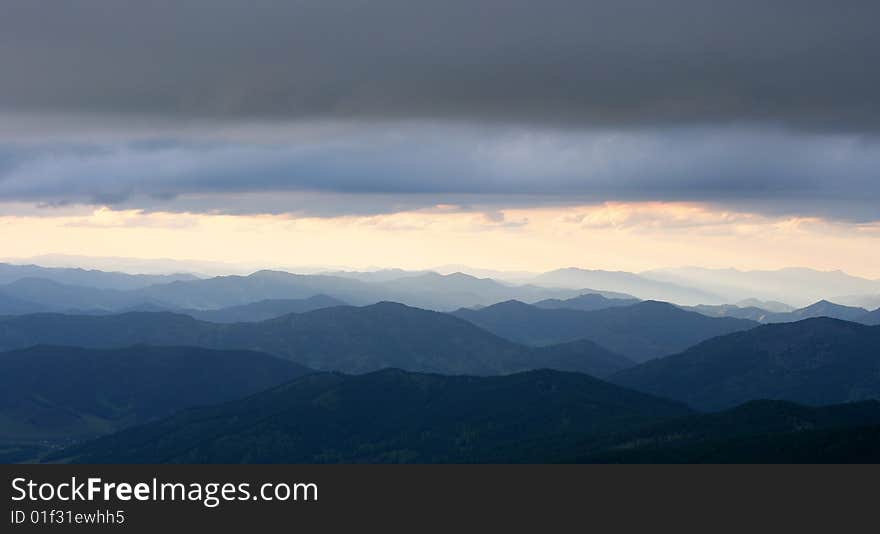 Dramatic clouds under the Altai mountains