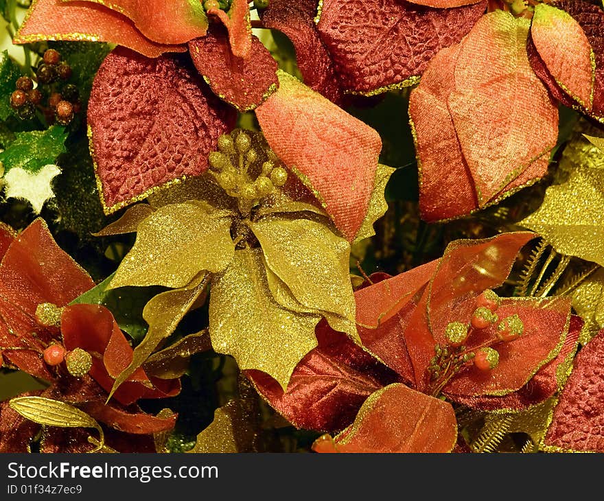 Bouquet or arrangement of artificial leaves and flowers usable for holidays and backgrounds. Bouquet or arrangement of artificial leaves and flowers usable for holidays and backgrounds.