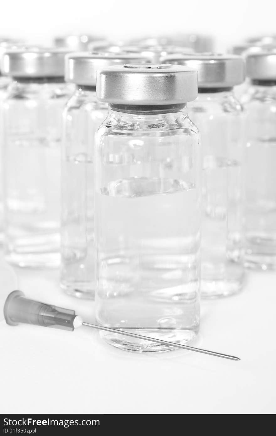 Bottles with a medical product, a transparent liquid