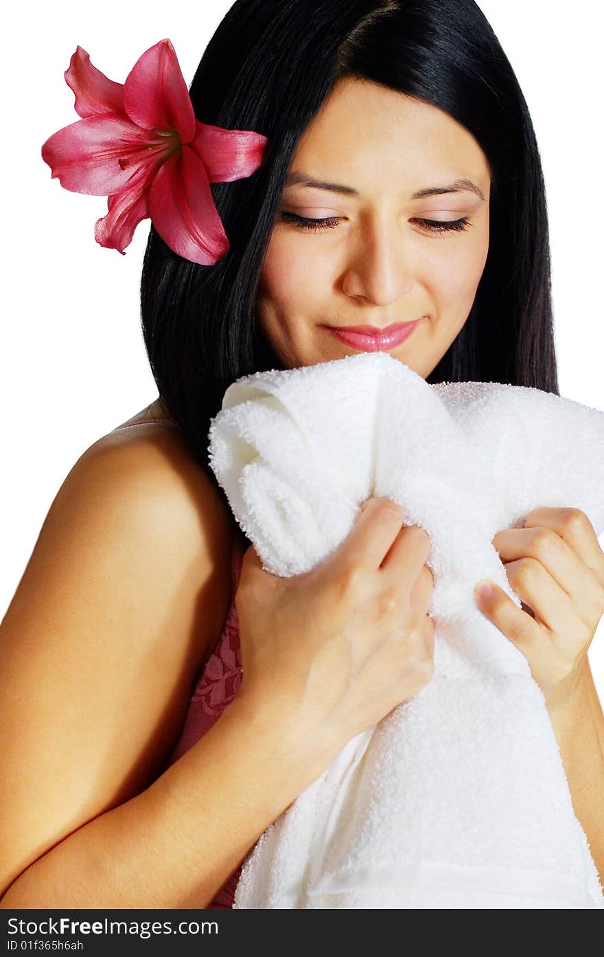 Beautiful young spa woman hugging a white towel. Beautiful young spa woman hugging a white towel.