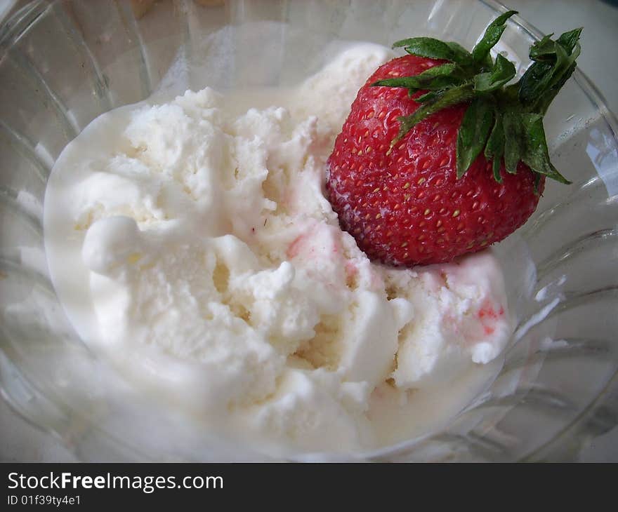 Appetizing strawberry with vanilla ice-cream. Appetizing strawberry with vanilla ice-cream