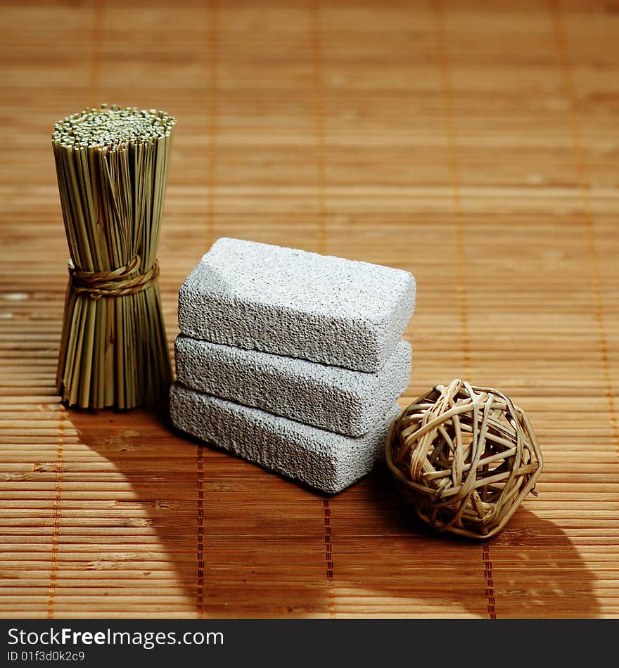 Brightly lit spa display on bamboo.