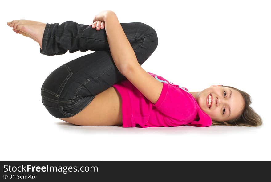 Smiling stretching teenage girl on white background. Smiling stretching teenage girl on white background