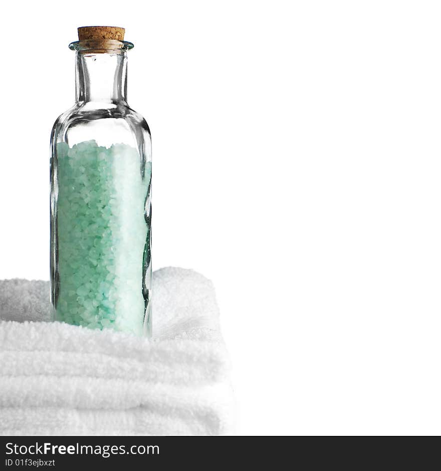 Bath towels and bath salt against a white background. Bath towels and bath salt against a white background.