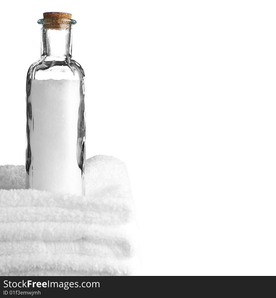 Bath towels and bath salt against a white background. Bath towels and bath salt against a white background.