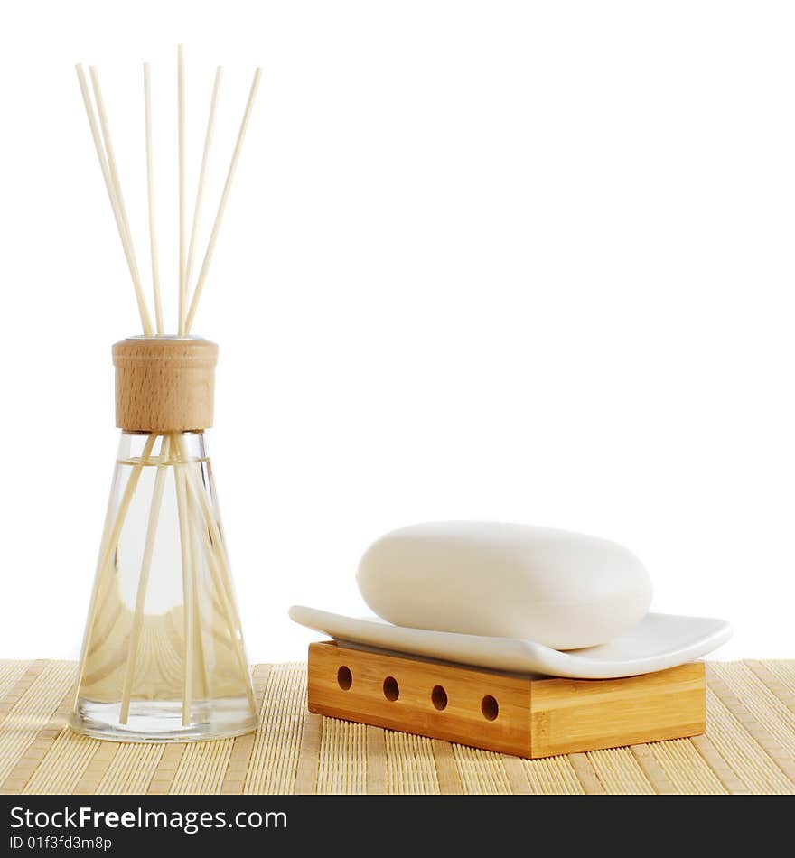 Reed diffuser and soap against a white background. Reed diffuser and soap against a white background.