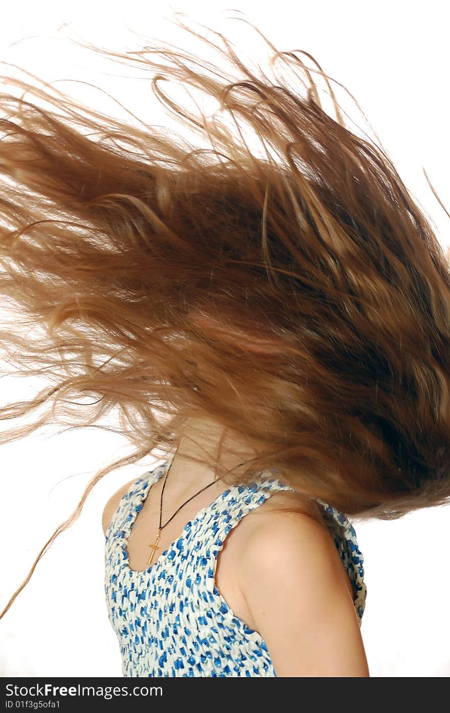 Portrait of a little girl with her hair flying. Portrait of a little girl with her hair flying