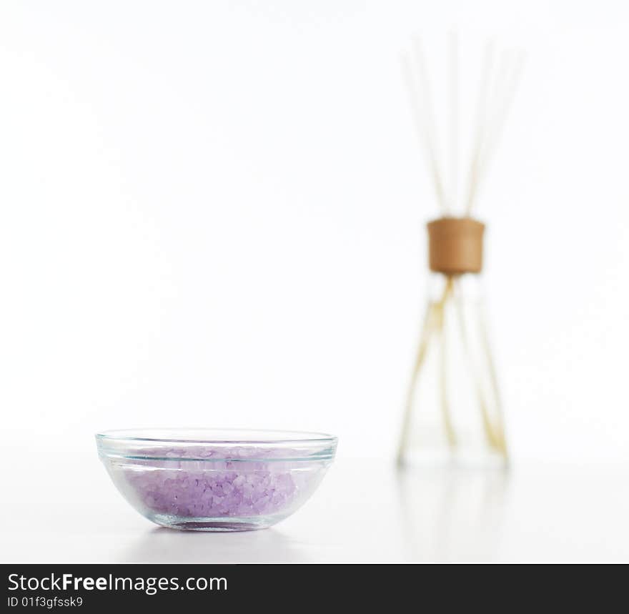 Bath salts on display against white, diffuser in the background. Bath salts on display against white, diffuser in the background.