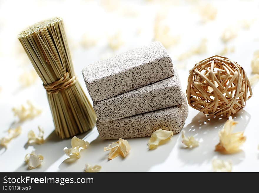 Brightly lit Pumice Stone Spa Display on White