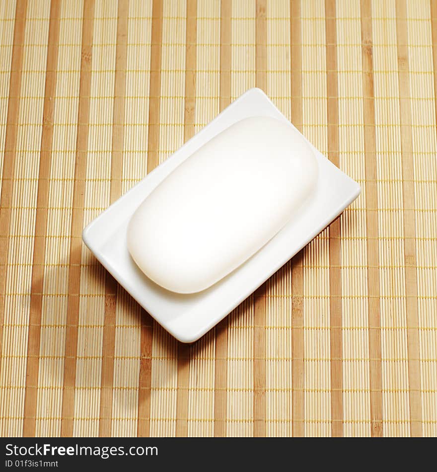 Brightly lit spa display on a reed mat.