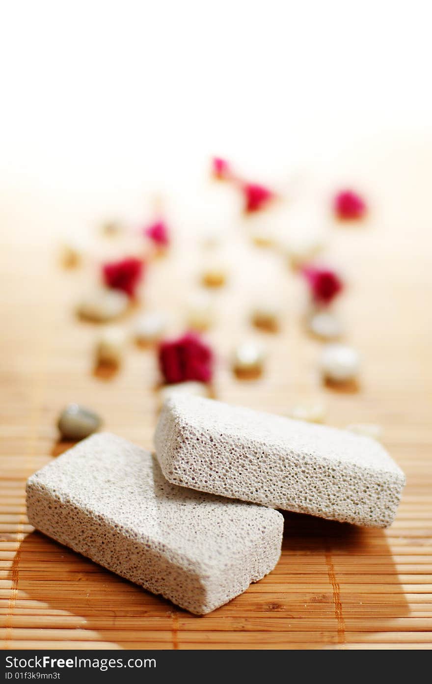 Pumice stones on top of a bamboo mat. Pumice stones on top of a bamboo mat.