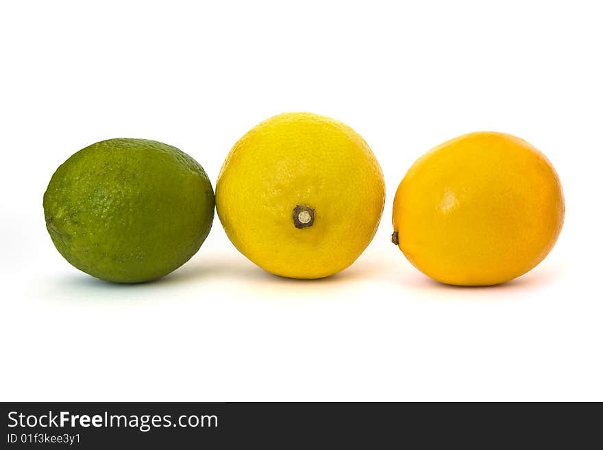 Lime and lemons isolated on white background