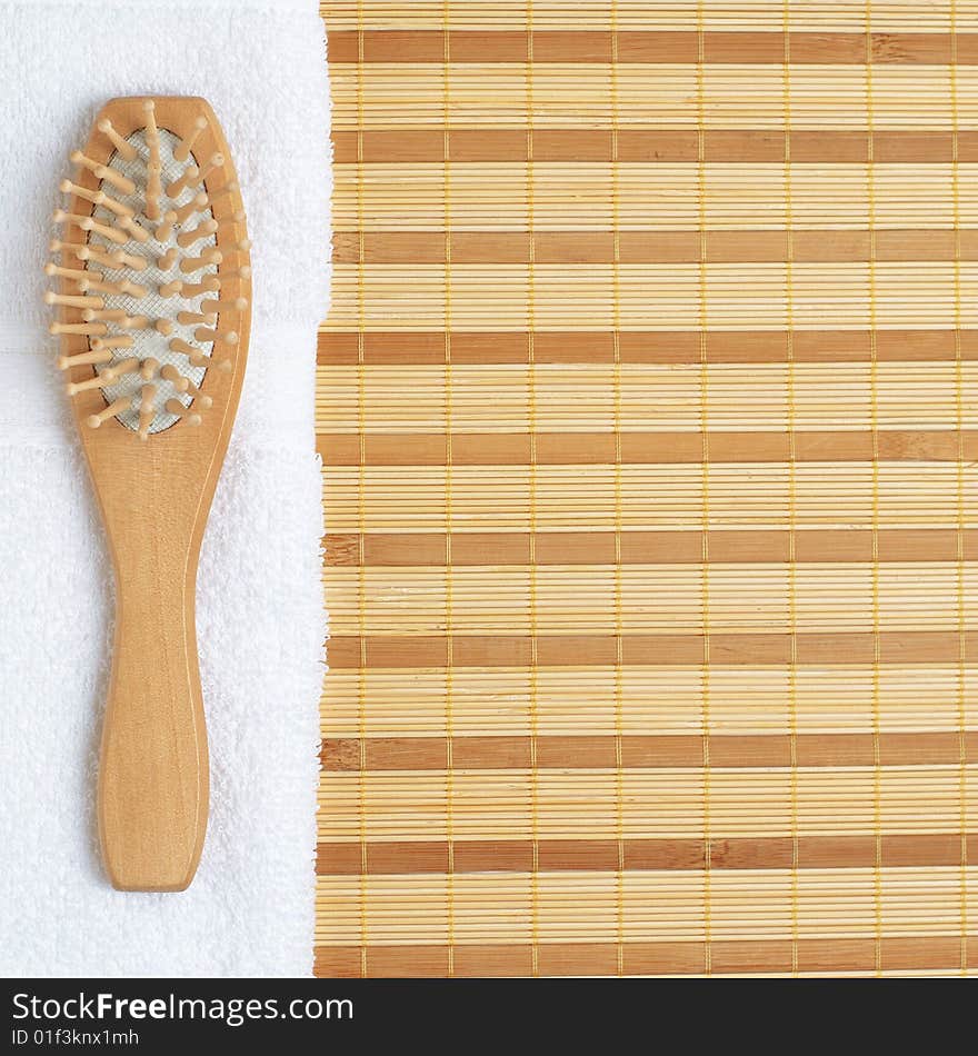 Brightly lit spa display on top of a bamboo mat.