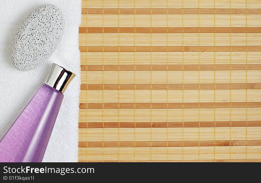 Brightly lit spa display on top of a bamboo mat.