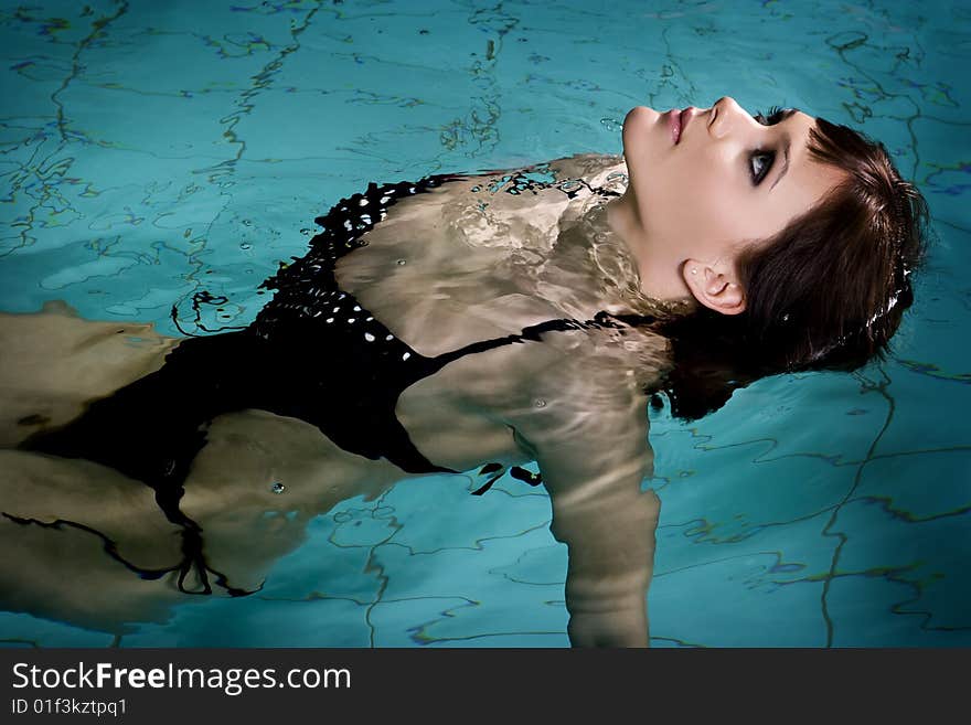 Beautiful young woman in sport swimming pool. Beautiful young woman in sport swimming pool