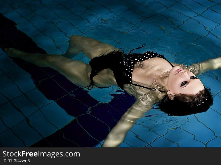 Beautiful young woman in sport swimming pool. Beautiful young woman in sport swimming pool