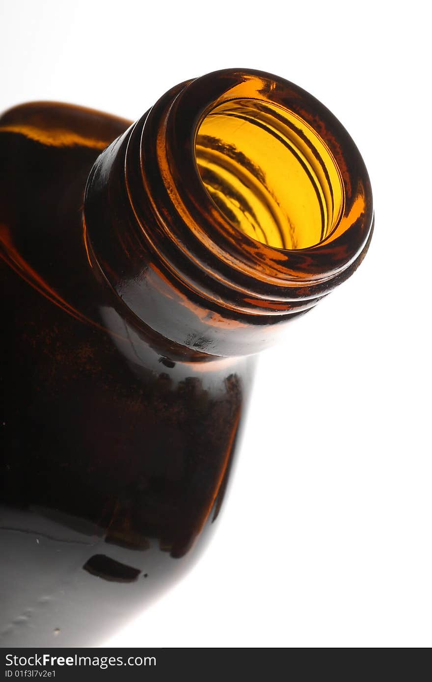 Close-up view of brown bottle,focus on the bottleneck. Close-up view of brown bottle,focus on the bottleneck.