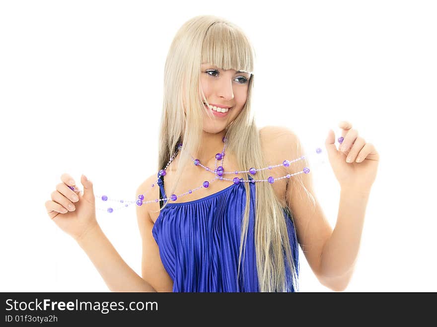 Beautiful young blond woman wearing beads and a purple dress