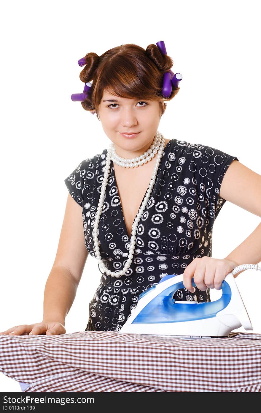 Housewife is ironing a shirt on white background