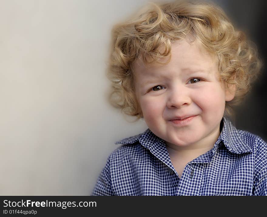 Very Cute Outdoor portrait of a Little boy