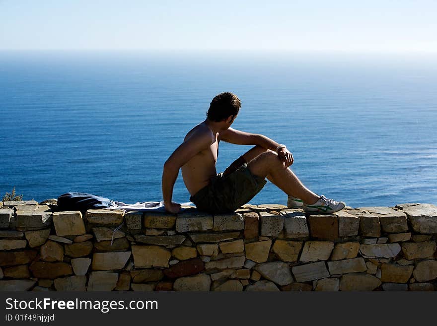 Young caucasian topless man having a rest. Young caucasian topless man having a rest