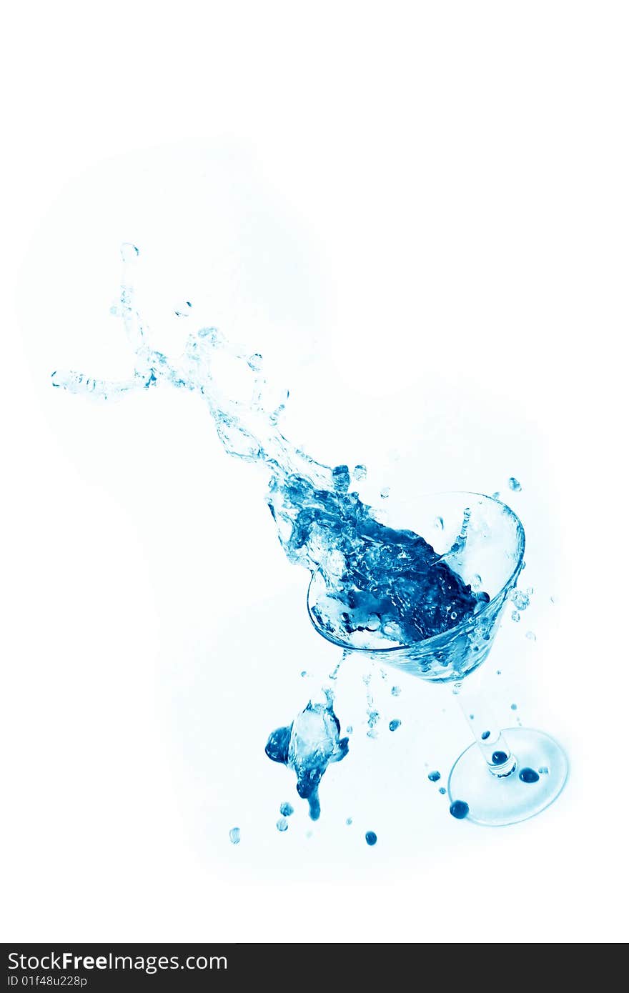 Wine being poured into a wine glass on white background